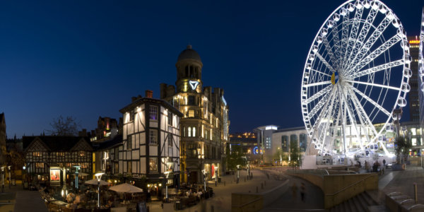 Manchester lit up on a late summer evening